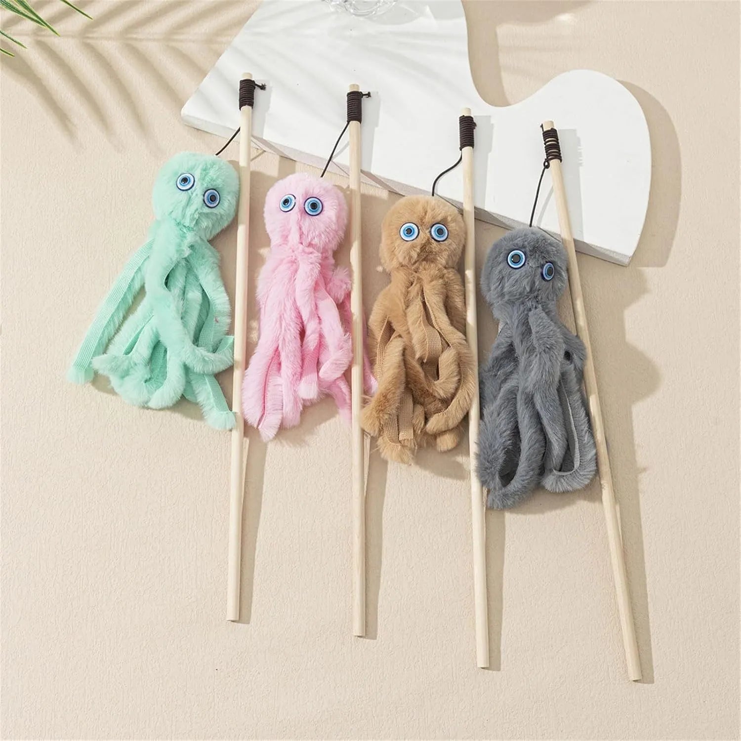Colourful octopus cat toy with eyes on a long stick for interactive indoor play with kittens and cats