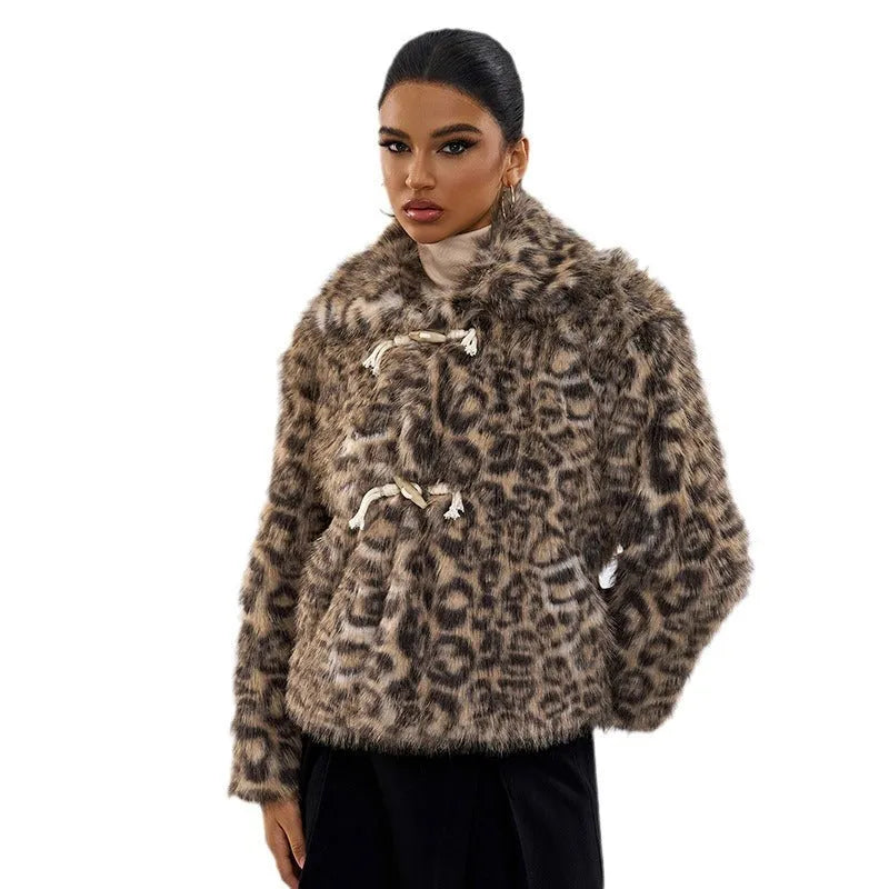Women's leopard print street fashion coat with a buckle detail on the lapel