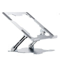 Grey adjustable aluminium laptop stand in folded and open positions on a desk.