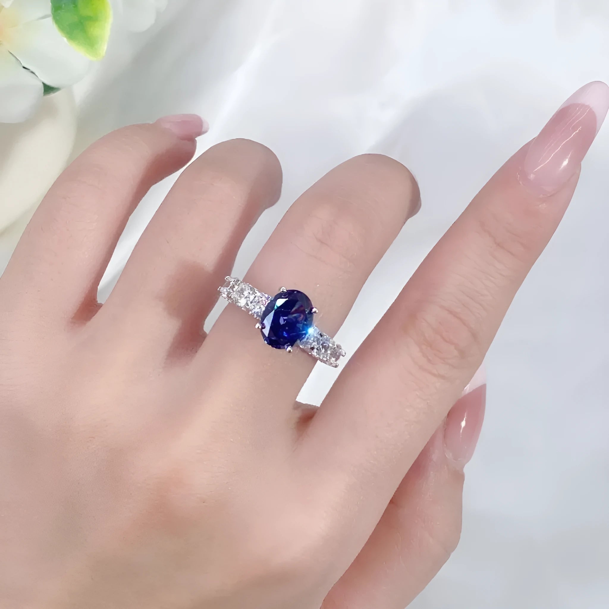 Silver heart-shaped ring with ice flower cut colour zircon stone in a tan sang colour.