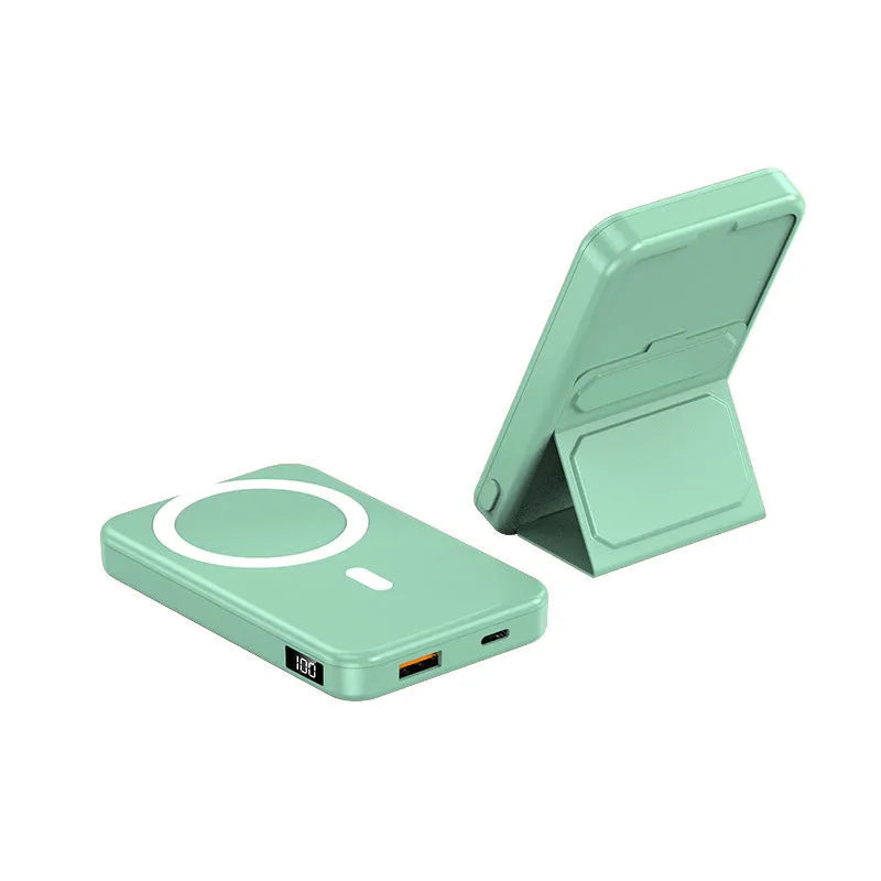 Magnetic wireless charging power bank with folding stand unfolded, shown in navy blue colour.