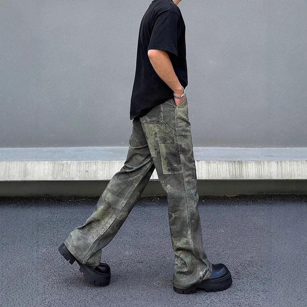 Men's straight-leg denim jeans featuring a digital camouflage pattern in picture colour.