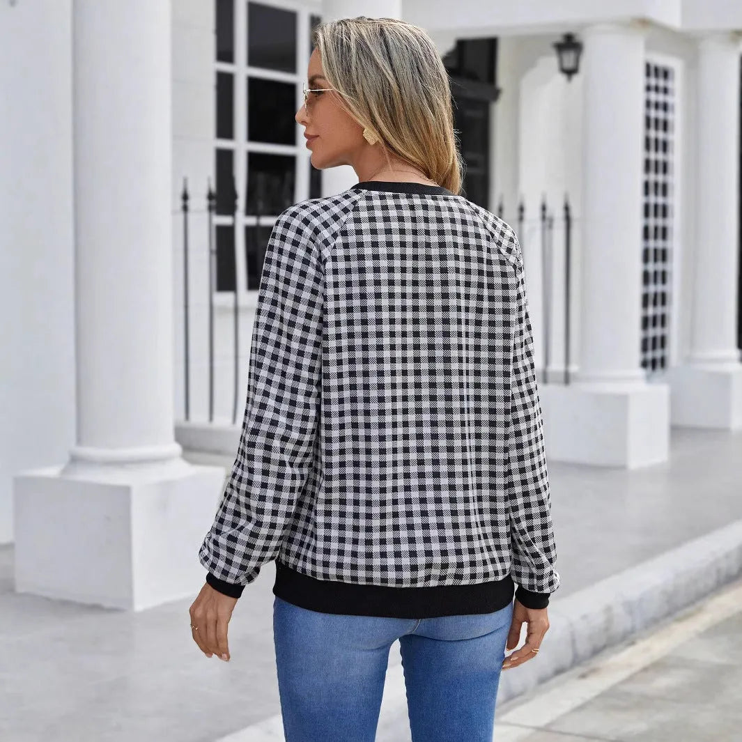 Black men's long sleeve sweater with a striped plaid print pattern.