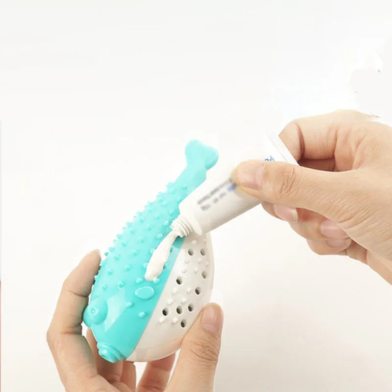 Silicone fish-shaped chew toy for cats in four colours: blue, green, pink, and yellow.