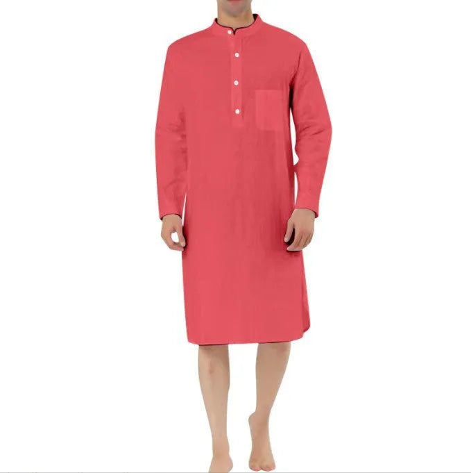 A man's simple cotton shirt robe in a light colour, shown hanging, with visible button front and pockets.