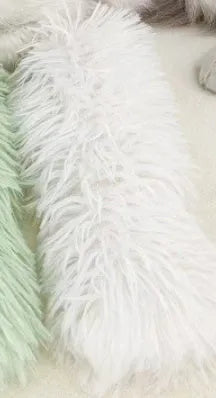 Soft plush cat toy pillow in blue, green, pink, and white colours measuring 27cm by 10cm