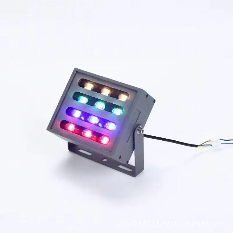Outdoor waterproof LED rainbow tree projection spotlight with aluminum alloy housing on a dark background.