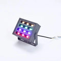 Outdoor waterproof LED rainbow tree projection spotlight with aluminum alloy housing on a dark background.