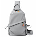 Black and grey mens casual single shoulder crossbody bag made of waterproof polyester.