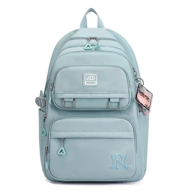 Girls large capacity nylon school backpack with anti-theft function and physiological curve back support