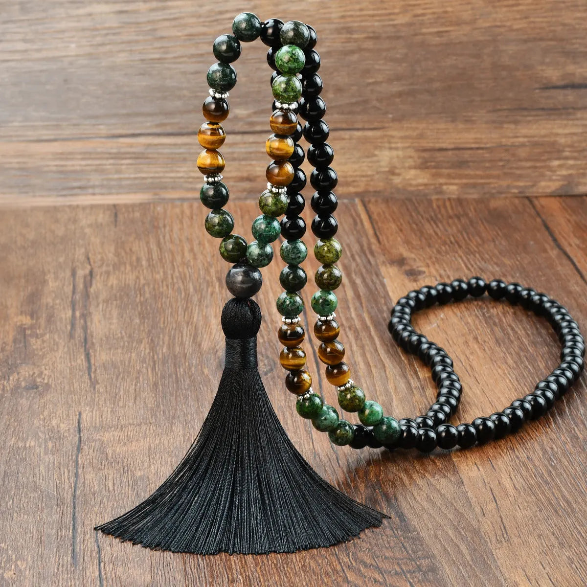 Long beaded bohemian necklace with 108 natural stones, a geometric pendant, and colourful tassels on an 81cm chain.