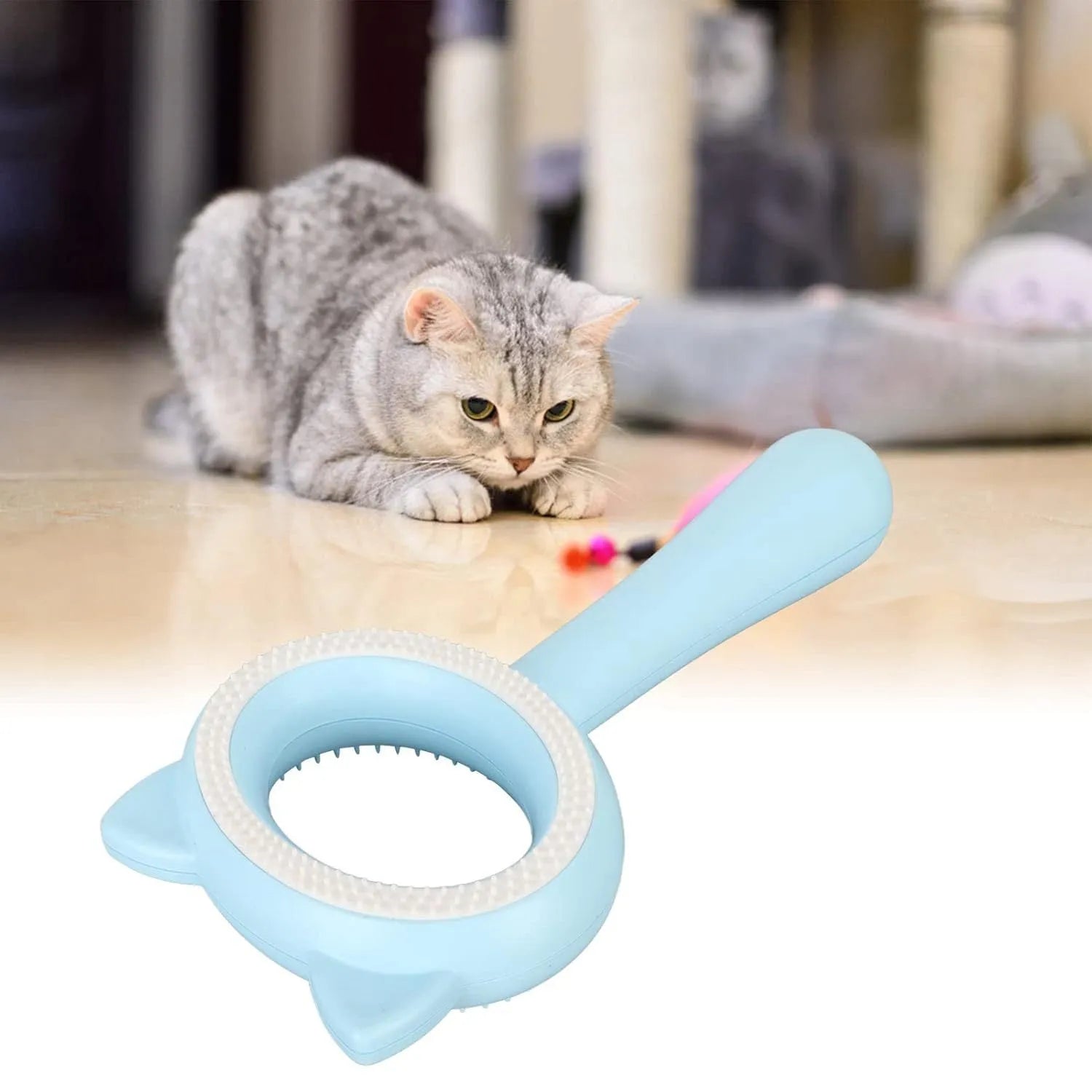 Blue and white double-sided pet grooming brush with a comfortable handle for cats and dogs.
