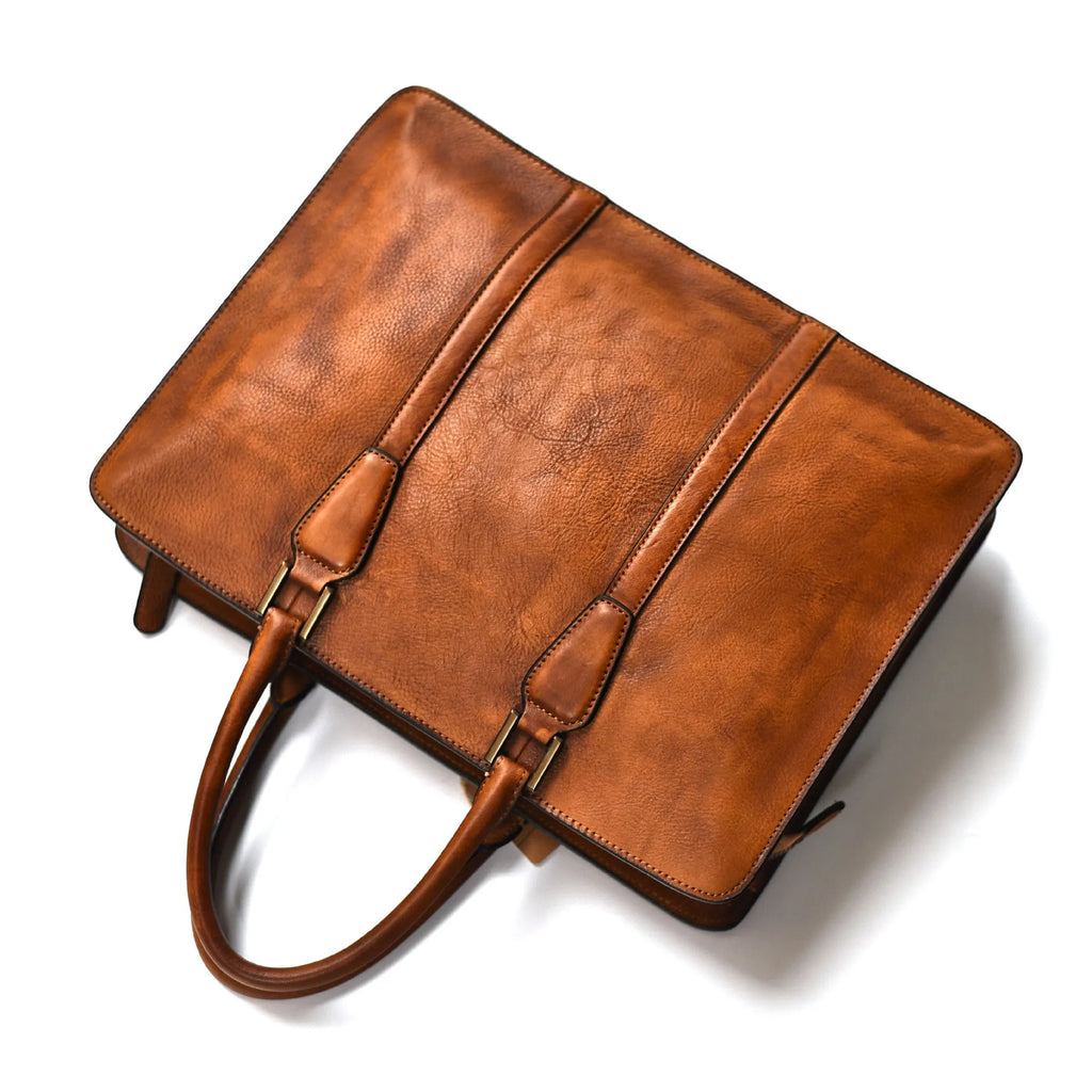 Men's brown leather handbag with horizontal design and zipper opening