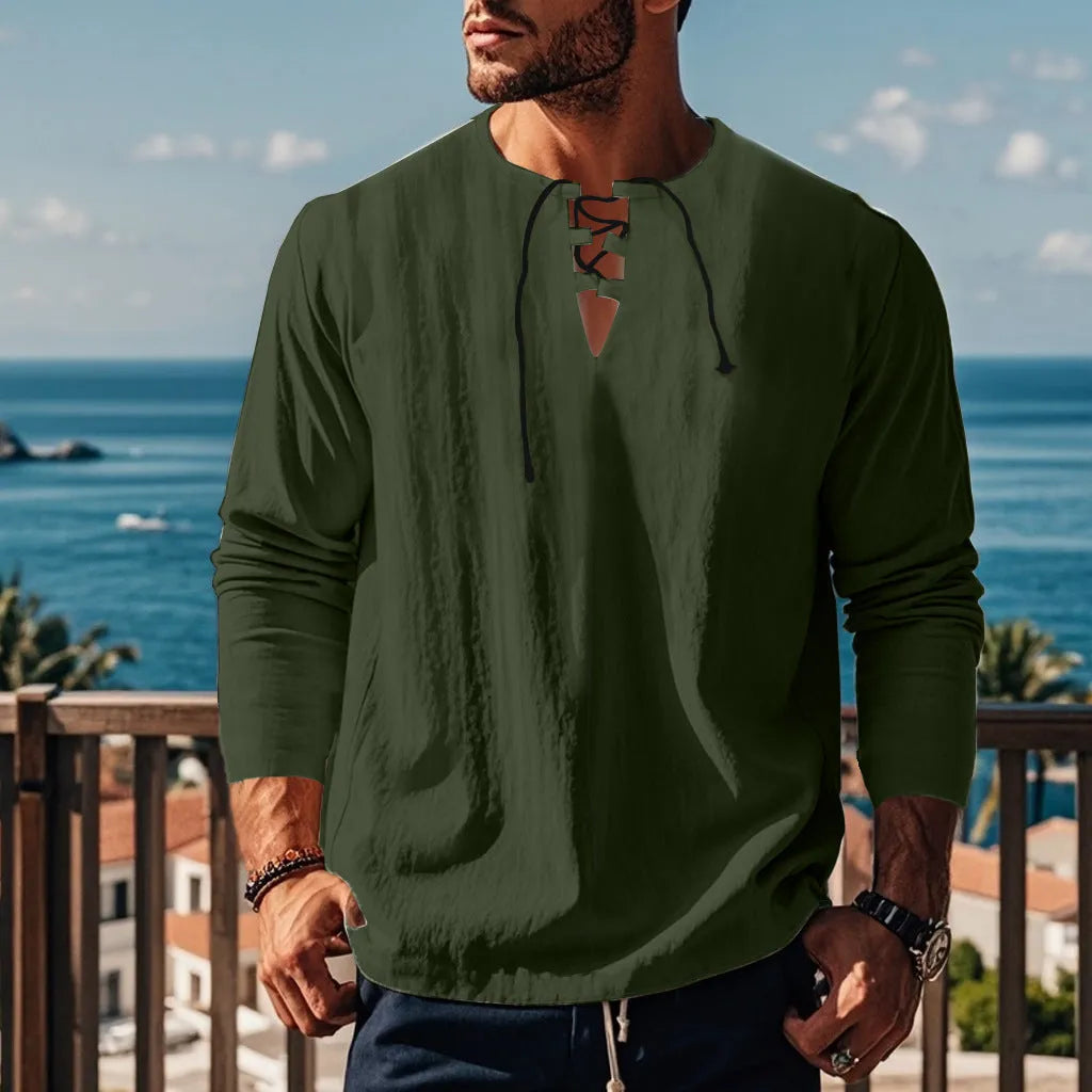 Man wearing a loose fit solid colour cotton blend beach shirt in a casual setting.