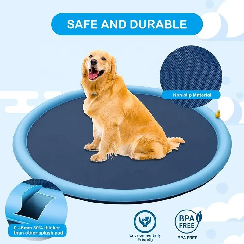 Large blue dog splash pad with textured anti-slip base on grass, with a dog playing in the shallow water.