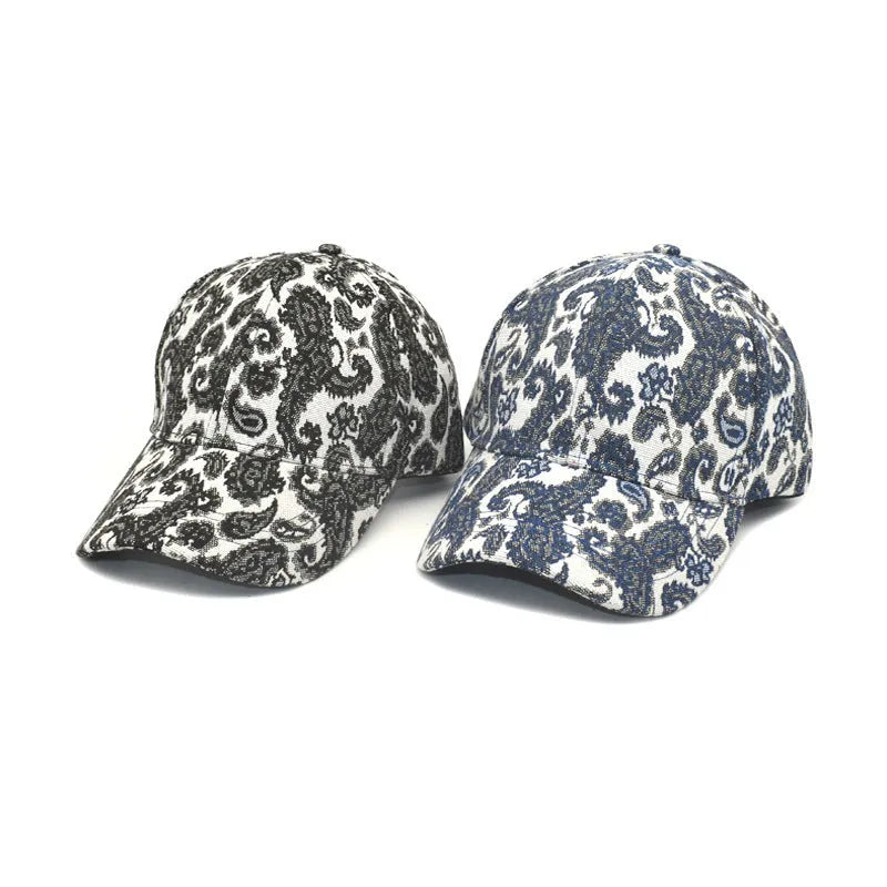 Blue polyester baseball cap with printed paisley pattern showing dome crown design