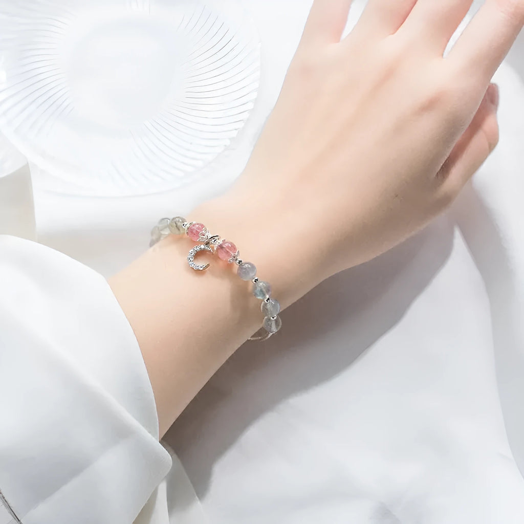 Natural moonstone handmade bracelet with crescent moon and crystal charms on adjustable chain