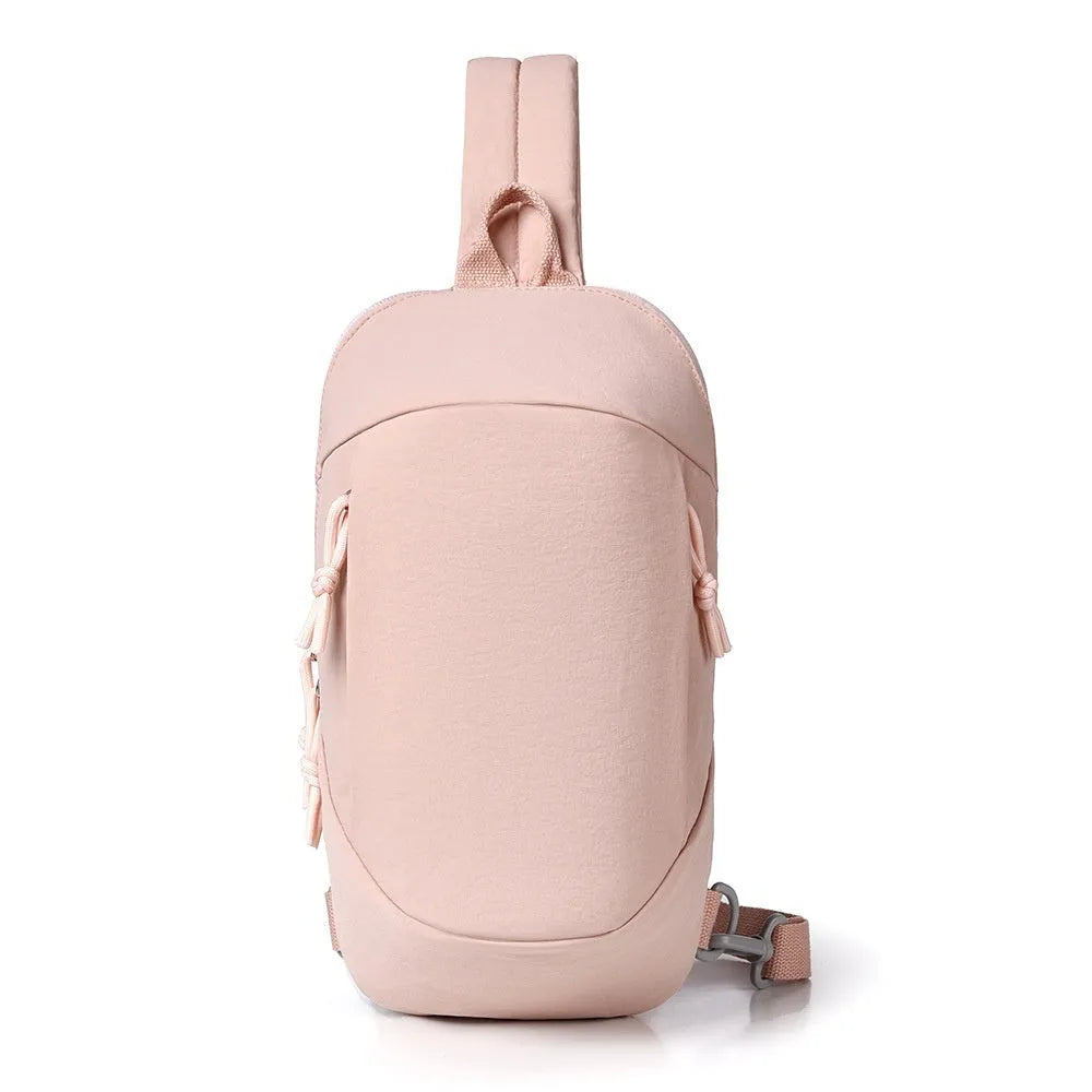 Outdoor girls crossbody bag in nylon, shown in army green with a mobile phone pocket.