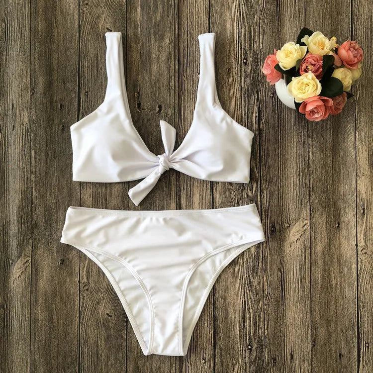 Women's solid colour bikini set with sleeveless top and matching briefs in polyester fabric