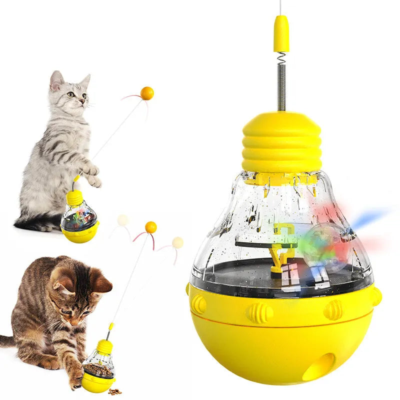 Rocking cat interactive toy with teaser stick and slow food dispenser in pink, purple, or yellow.