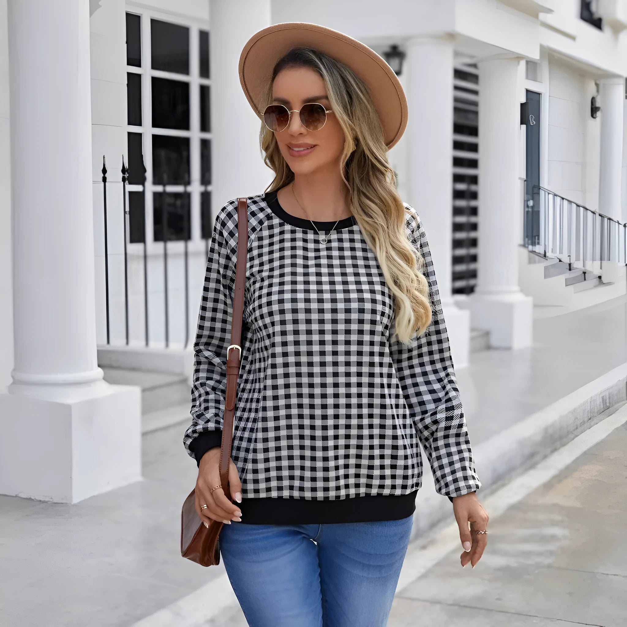 Black men's long sleeve sweater with a striped plaid print pattern.