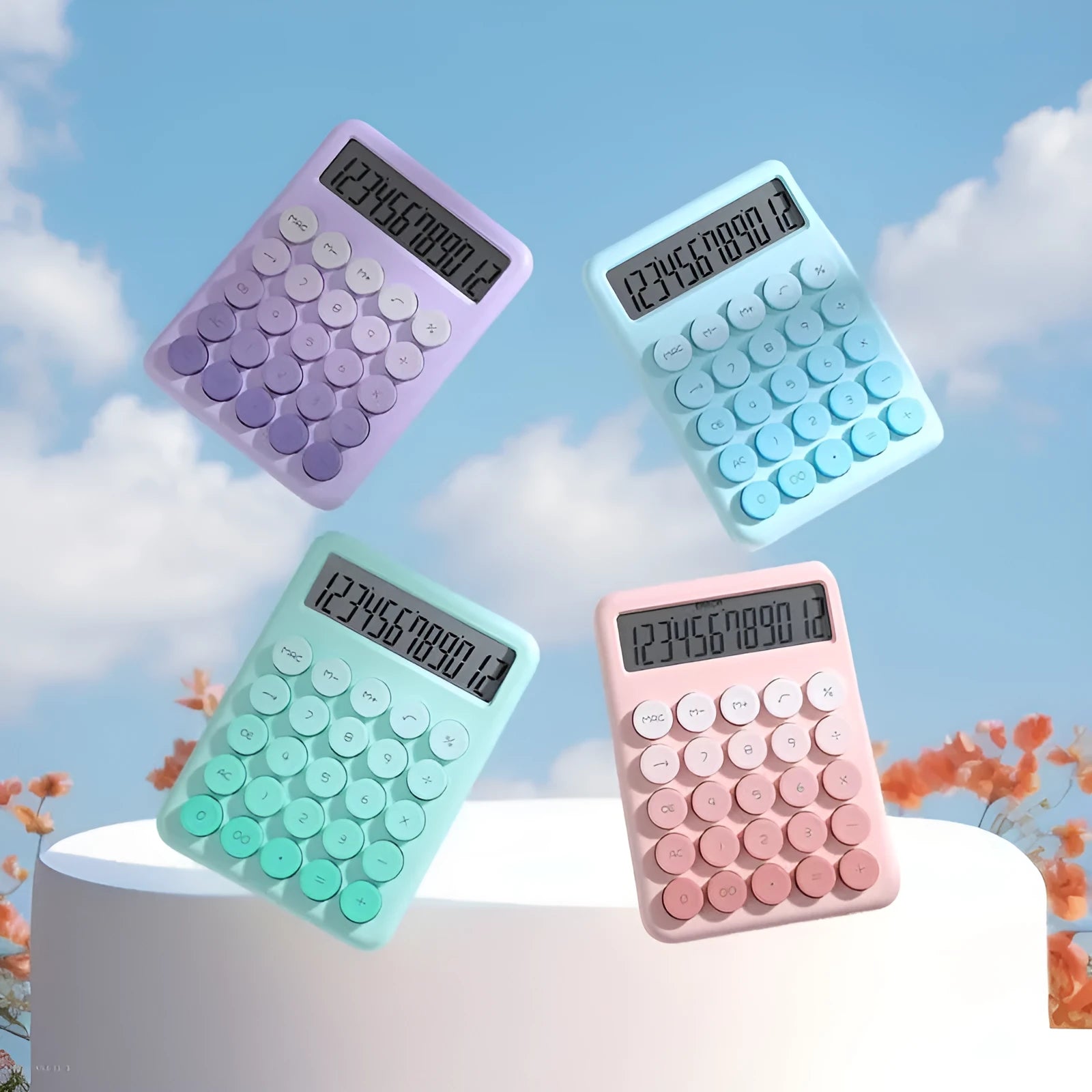 A gradient colour desk calculator on a desk, showing violet, mint green, blue, and pink colour options.