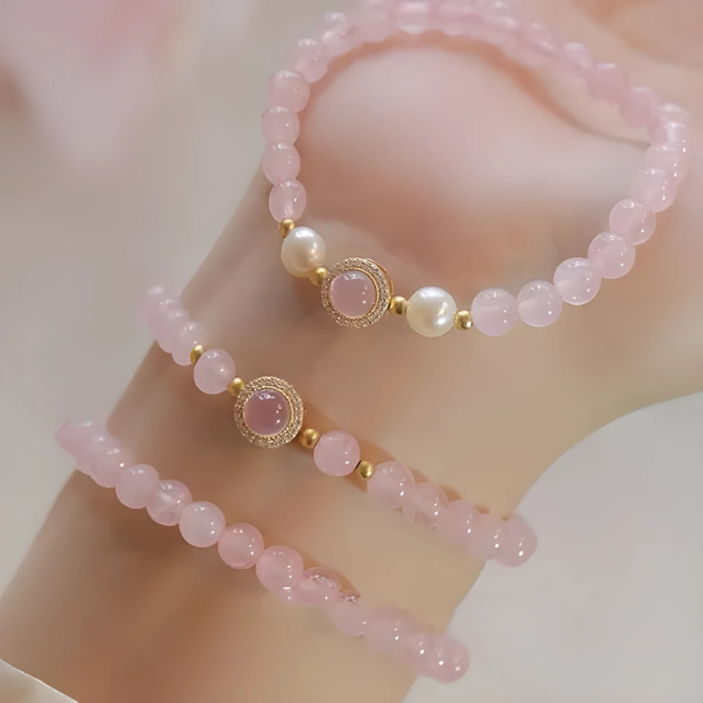 Women's copper bracelet with pink crystal pearls and golden balls, natural style jewellery.