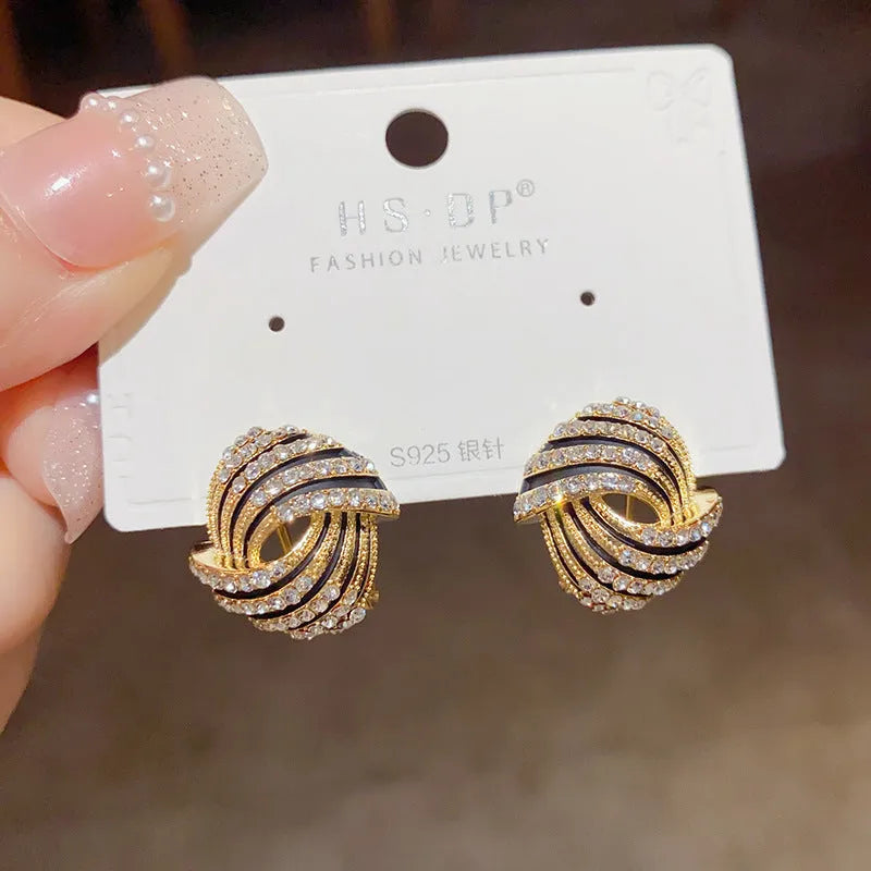 Pair of super flash rhinestone ear studs with thick real gold plating on copper base, geometric shape