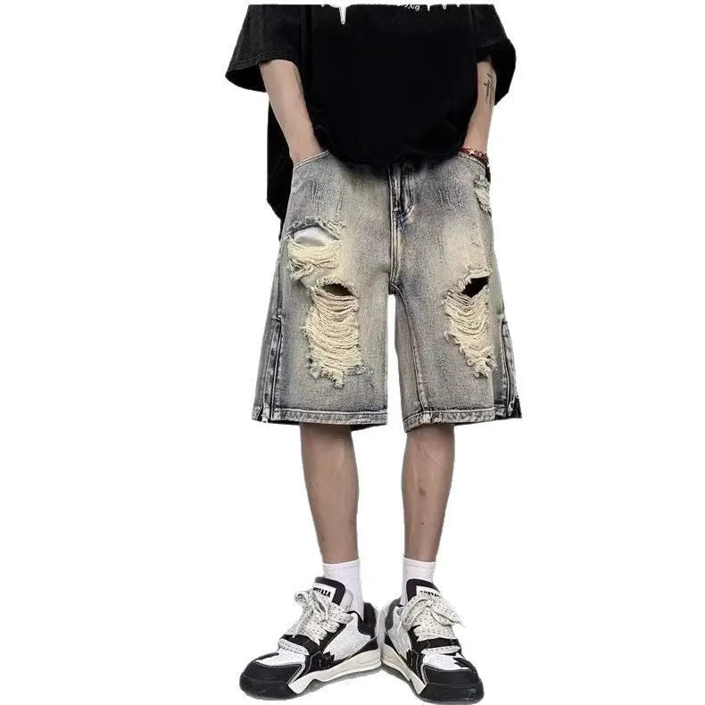 Blue retro-style denim shorts with a loose wide-leg cut and tattered detailing.