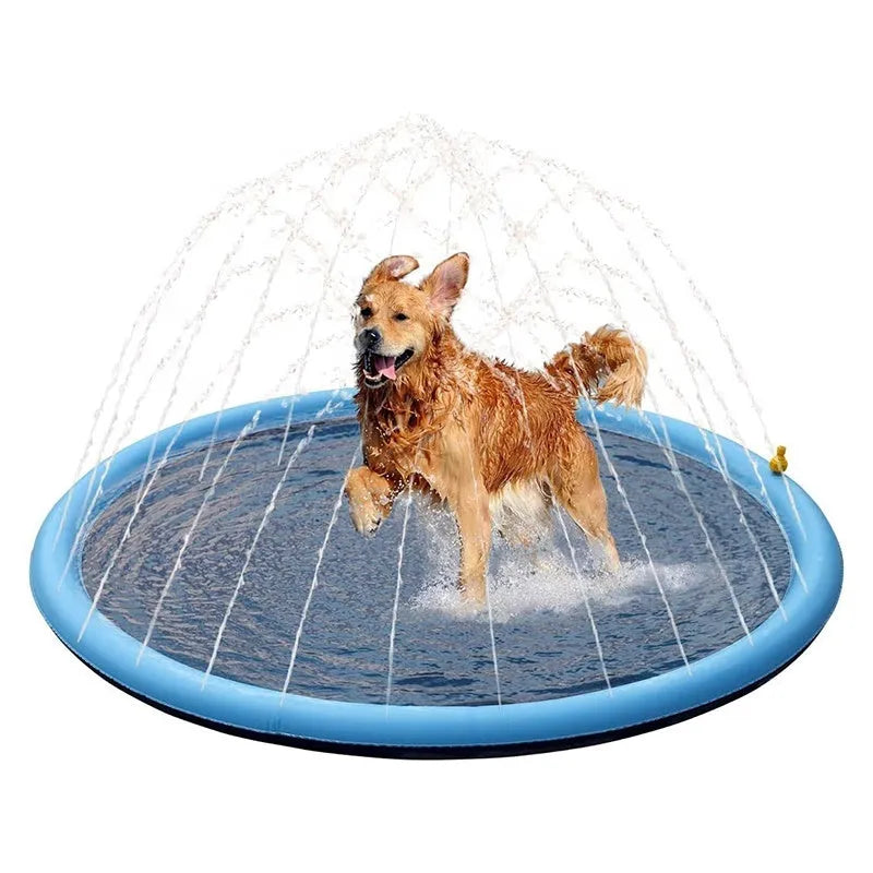 Large blue dog splash pad with textured anti-slip base on grass, with a dog playing in the shallow water.
