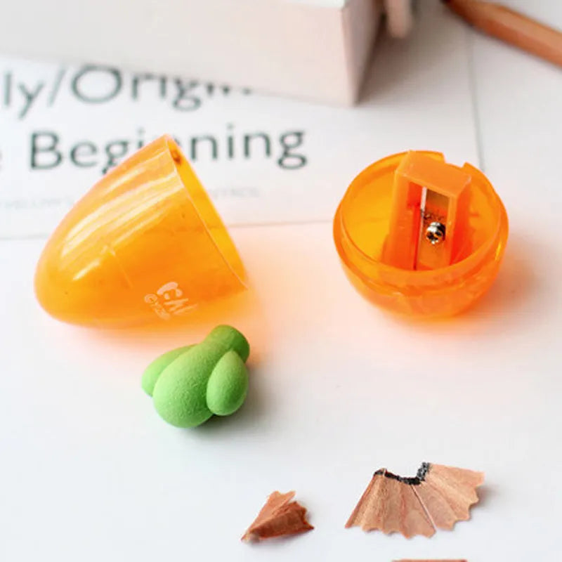 Cartoon carrot pencil sharpener with plastic shell, 7cm full length, 4cm blade, and carrot colour.