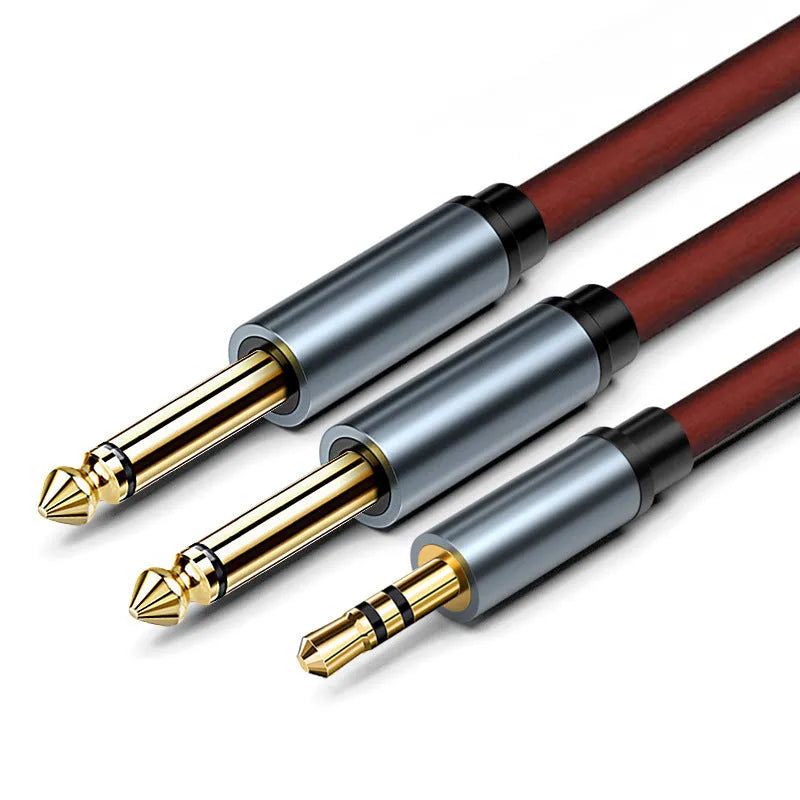 3.5mm to dual 6.5mm male audio cable with black PVC jacket and gold-plated connectors.