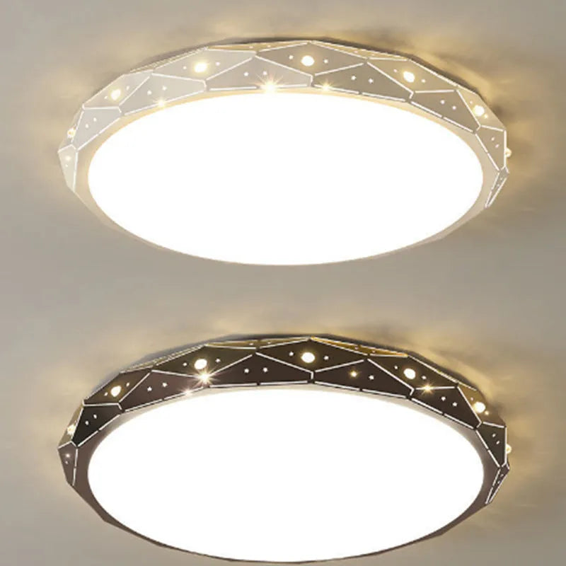 Round black iron frame LED ceiling light on a white ceiling.