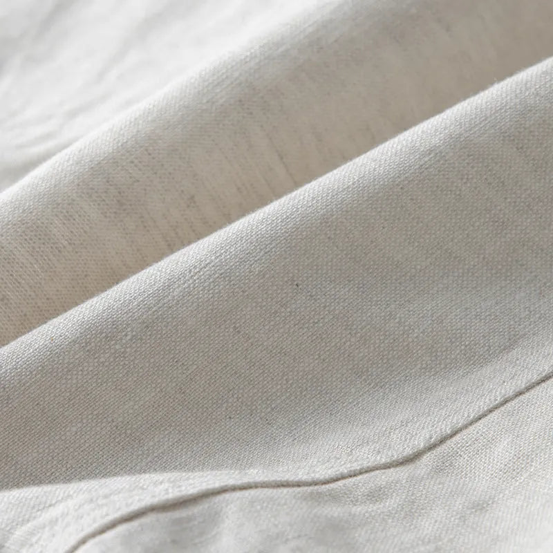 Men's casual linen suit jacket in loose fit with long sleeves showing solid colour options