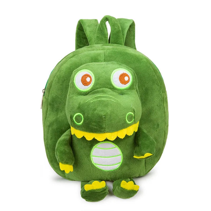 Blue dinosaur plush backpack with embroidered character, soft handle, and backpack straps showing 20-litre capacity