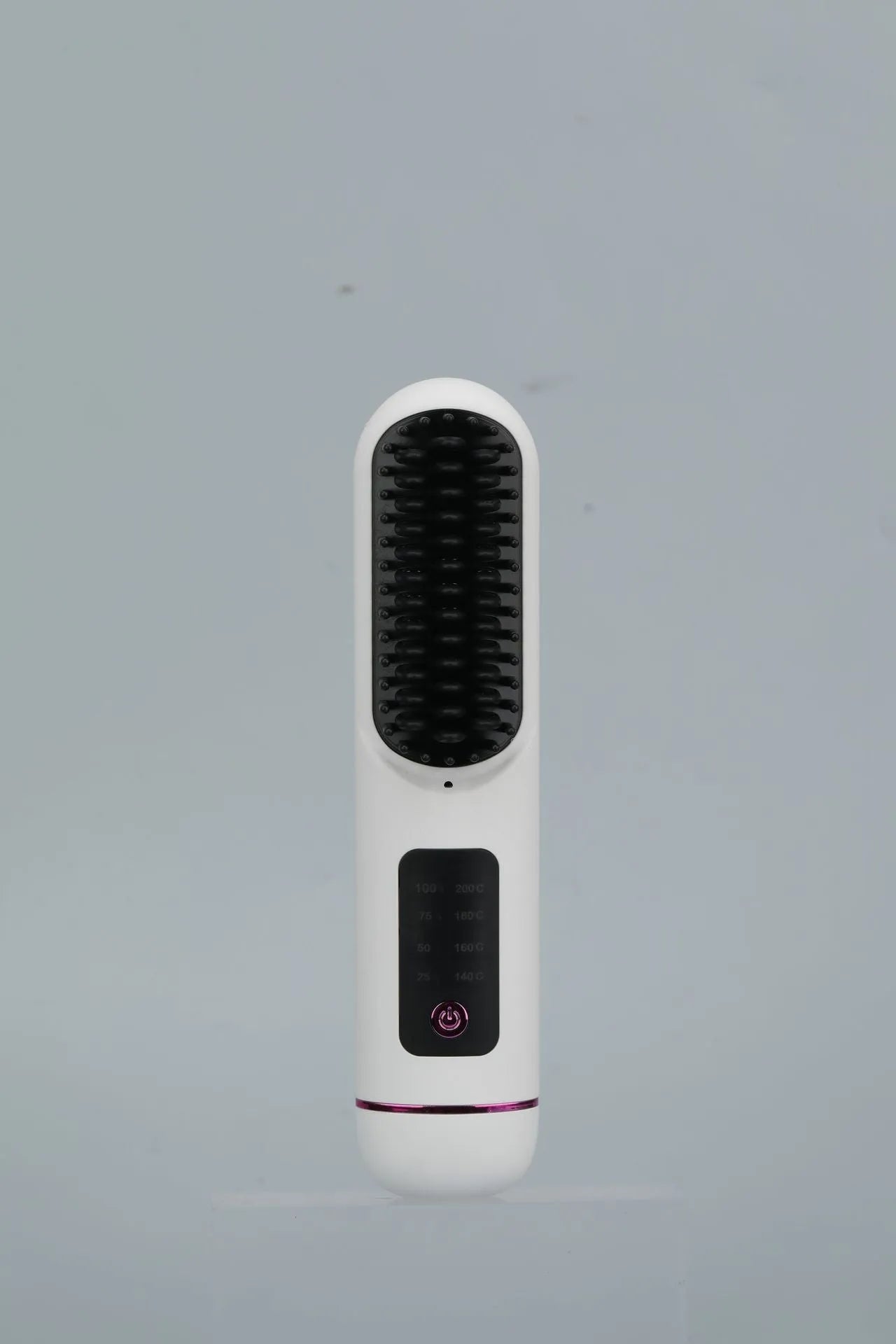 Portable negative ion hair comb in white, dark blue, or grey colour, showing compact size and teeth.