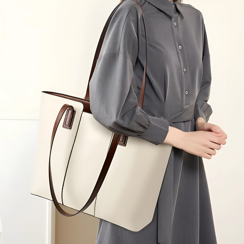 Women's black genuine leather commuter bag with multiple internal compartments in horizontal square shape