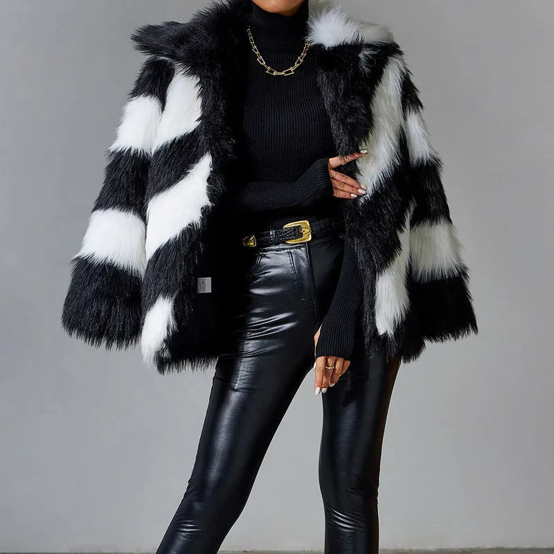 Women's faux fur coat with contrasting lapels and a full fur collar in a regular fit.