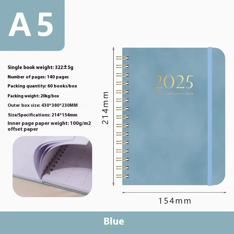 A5 leather notebook with metal coil binding in various colours including black, blue, and green.