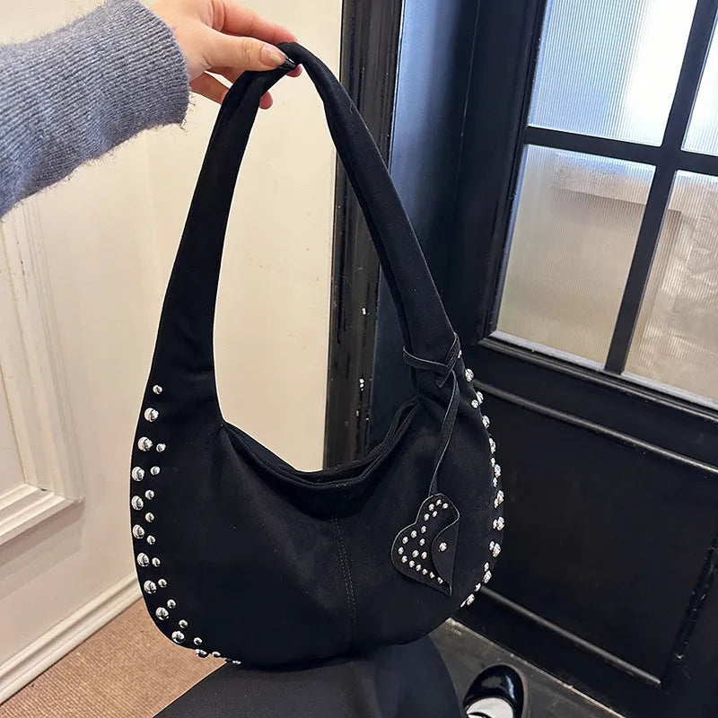 Soft plush women's retro tote handbag in strapless design showing colour options.