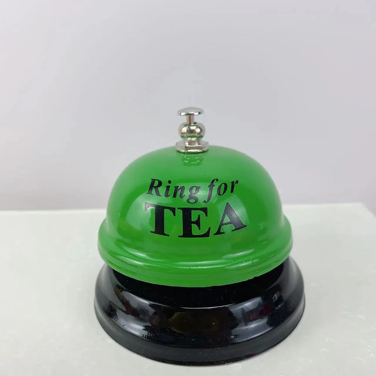 Iron game bell shown in one of ten available colours: blue, green, pink, red, yellow, green tea, or rose kiss.