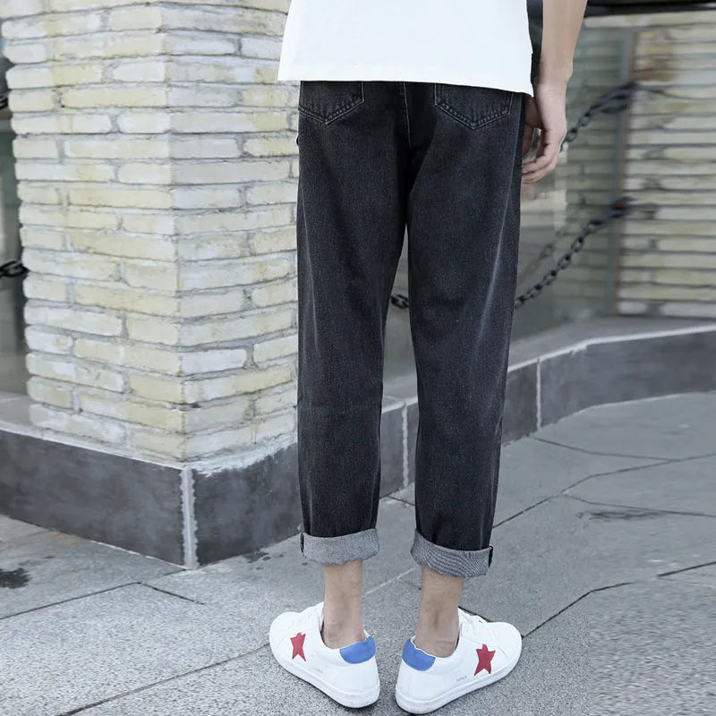 Men's loose straight light leg jeans in black and blue colours on a size chart