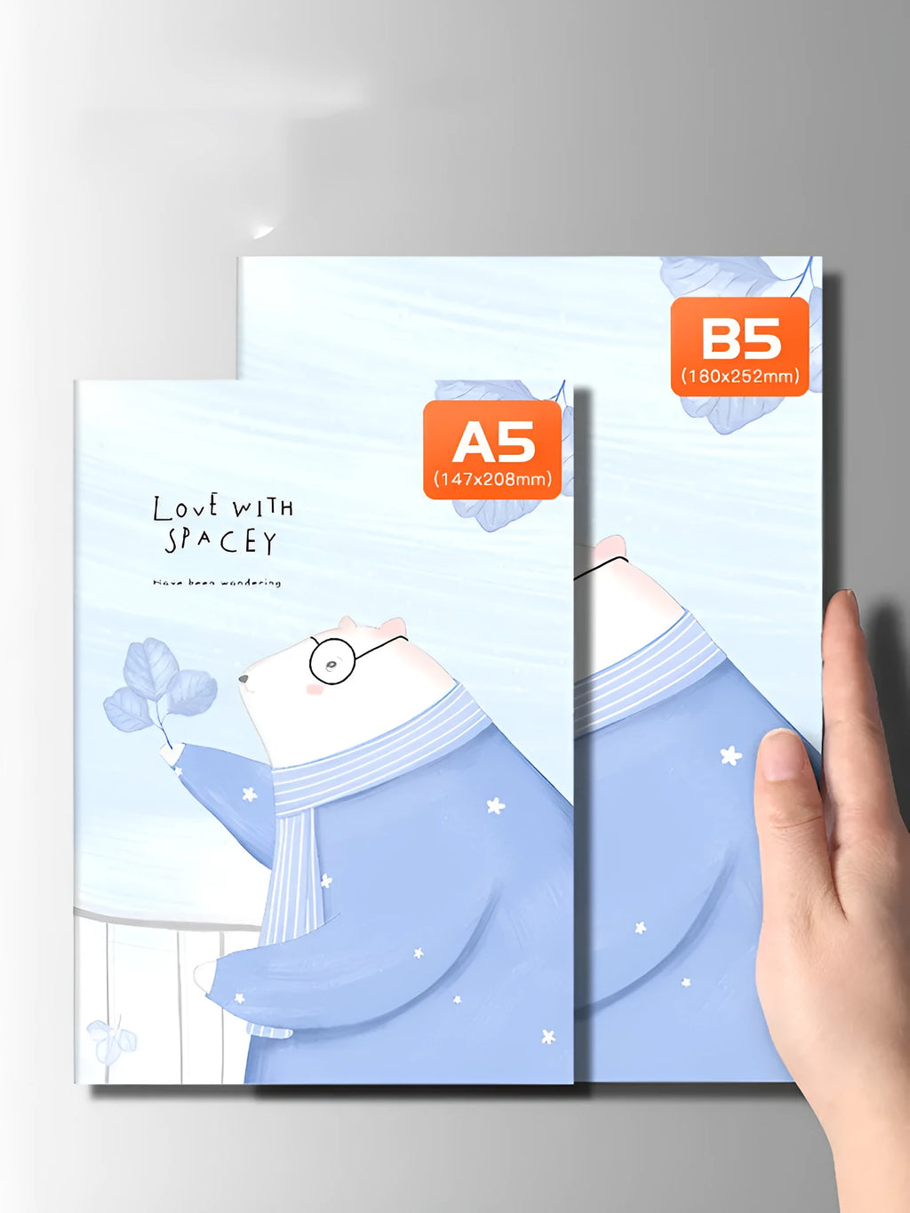 Pack of 10 A5 and B5 soft cover kraft paper notebooks with various designs, showing thread binding.