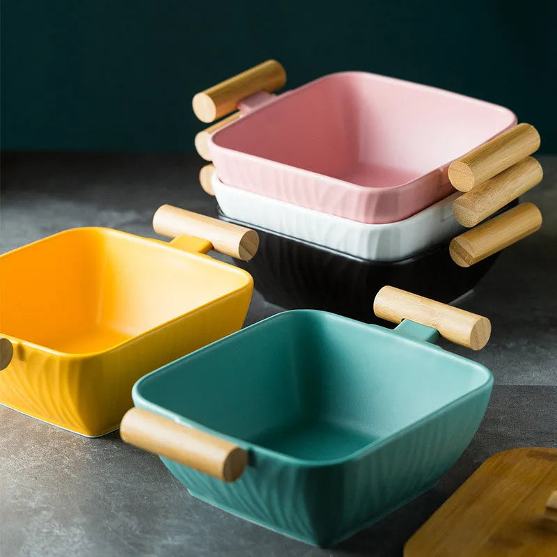 Porcelain ceramic bowl with irregular shape and matching lid in modern simple design