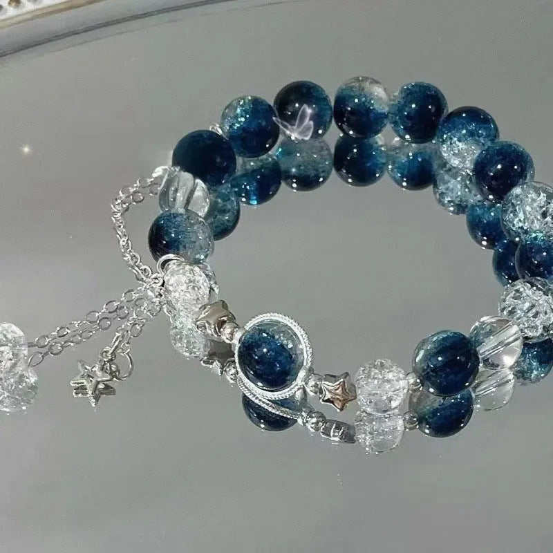 Chinese style glass bead bracelet with bamboo leaf design and manual craftsmanship details.