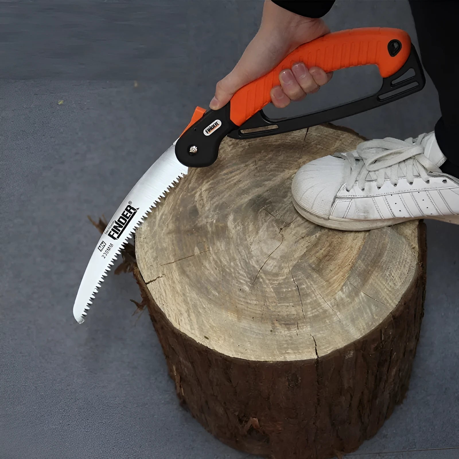A folded and open 230mm folding garden saw with a TPR grip and 65MN steel blade.