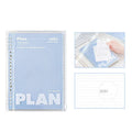 Blue and white A5 PVC spiral notebook with Wire-O binding on a flat surface