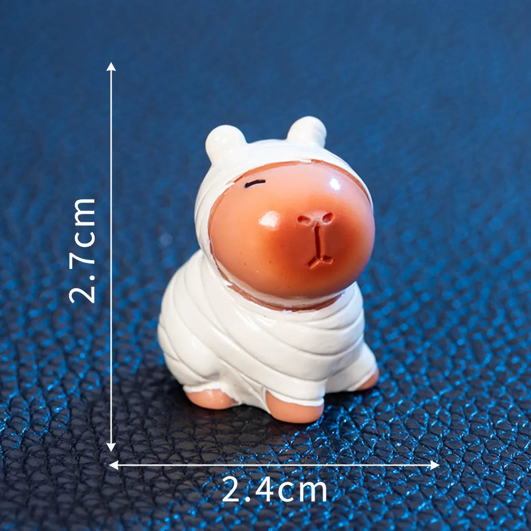 Halloween capybara resin figurine in one of eight designs like pumpkin or vampire.