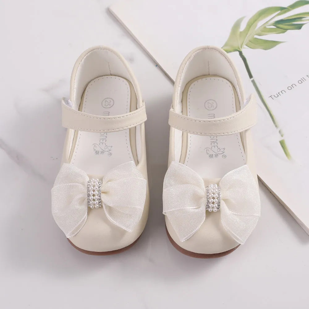 Princess PU leather bow flower girl shoes in beige with Velcro closure and low top design
