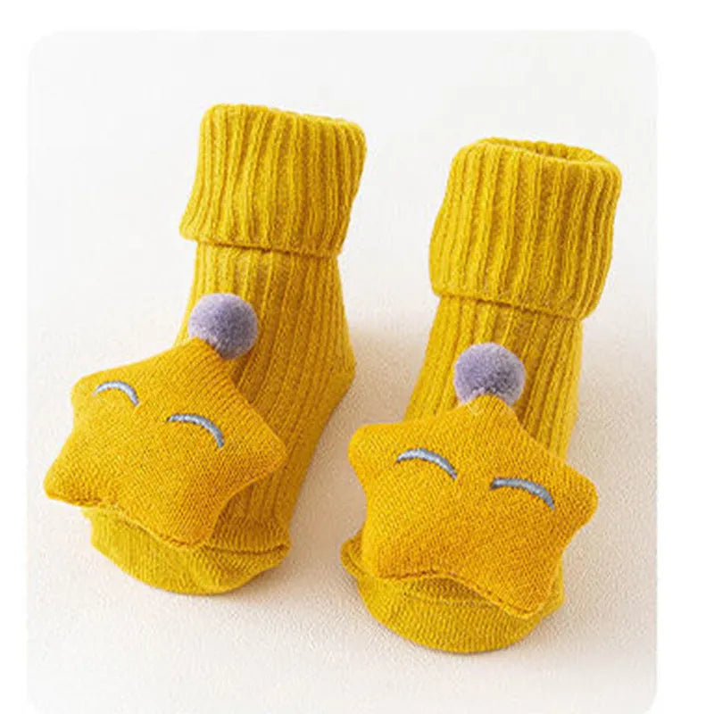 Cotton baby floor socks in various colours and patterns including bows, stars, and animal designs